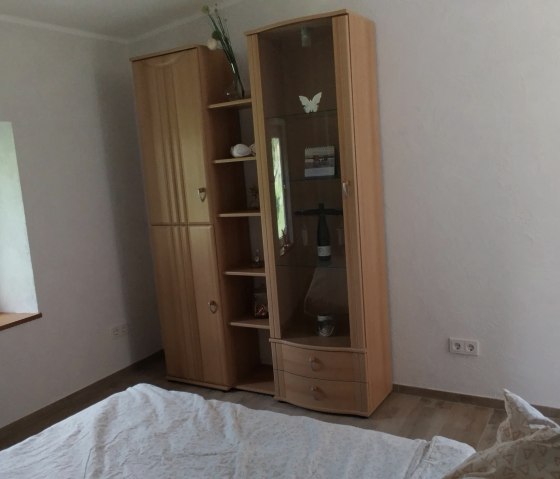 FeWo H&uuml;hn Schlafzimmer(c)TIBitMeS (1)