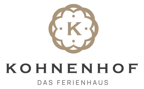 Un logo élégant pour la maison de vacances Kohnenhof. Il présente l'inscription "Kohnenhof" dans un design stylé.